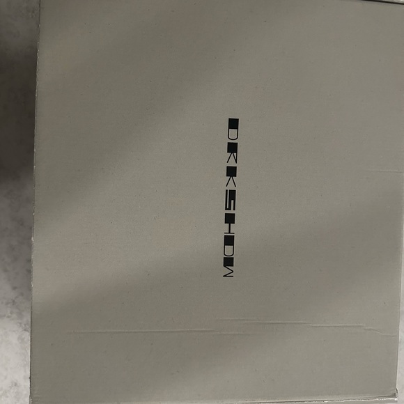 RICK OWENS DRKSHDW Abstract
high-top sneakers
Black/White - Picture 4 of 5